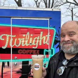 Bo enjoying a cup of coffee