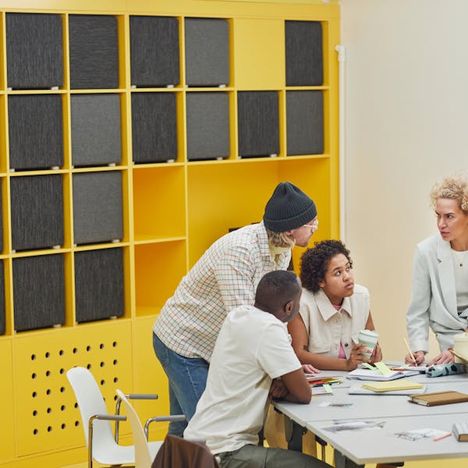 Team collaborating in a colorful modern office